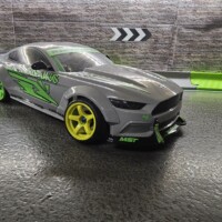 RC Drift Fahrzeug im grauen Sideways Look mit neonfarbenen Felgen RC Drift Auto im Sideways Design mit gelb-grünen MST-Felgen auf der Drift Strecke Dottikon